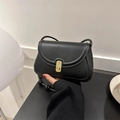 Minimalist black leather saddle bag with vintage gold buckle and slim knotted strap - Black