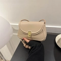 Minimalist beige saddle bag with golden clasp and stylish knotted shoulder strap - Khaki