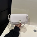 Retro cream white leather underarm bag featuring a stylish gold C-shaped metal buckle - White