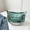 Borsa sportiva a tracolla verde menta in tessuto Oxford con ampia tracolla regolabile - Verde