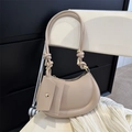 Beige crescent shoulder bag with knotted straps and matching mini pouch accessory - Khaki