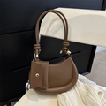 Dark brown crescent shoulder bag in sleek faux leather with matching coin purse detail - Brown