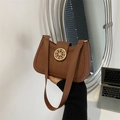 Dark brown quilted shoulder bag with golden round hardware on a chic crossbody design - Dark Brown