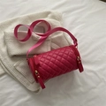 Magenta quilted cylinder crossbody bag with wide strap and gold hardware accents - Rose Pink