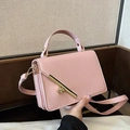 Pink lychee grain leather square bag with gold metal latch and adjustable strap - Pink