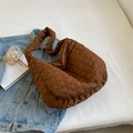 Quilted brown nylon tote bag with padded texture and wide shoulder strap for daily use - Brown