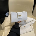 White lychee pattern crossbody bag with golden metal chain strap and twist lock - White