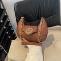 Caramel brown crescent shoulder bag with golden chain strap and round metal logo - Brown