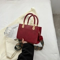 Burgundy square handbag with woven handles and vintage ethnic patterned wide shoulder strap - Burgundy