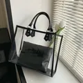 Minimalistische transparente PVC-Tote-Tasche mit schwarzer Innentasche und Rundgriffen - Transparent Mit Buchstabe