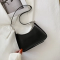 Glossy black patent leather hobo bag with top zipper and slender shoulder strap - Black