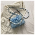 Light blue crossbody bag with organza bow and white pearl chain decoration - Blue