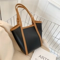 Bolso tote tipo cubo bicolor negro y marrón con correas ajustables de piel sintética - Negro