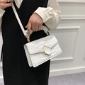 Elegant white faux crocodile leather handbag with gold buckle and ruched handle - White