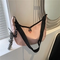 Pink nylon crossbody bag with black strap and checkerboard rabbit charm accessory - With Checkerboard Charm / Pink