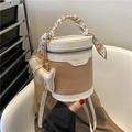 Beige and white bucket bag with crocodile texture, silk scarf handle, and dog charm - Khaki With Dog Charm