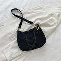 Black nylon crescent bag with silver chain detail and bright yellow zipper puller - Black