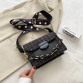 Fashionable black crossbody bag with tweed texture, daisy wide strap, and gold-black chain - Black