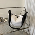 Minimalist white nylon crossbody bag with wide black strap and round buckle detail - White