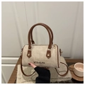Detail of beige suede Boston bag with brown leather handles and M'DoLnu embroidery - Off White