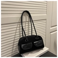 Dettaglio della borsa baguette nera vintage in pelle scamosciata opaca con tasche lucide - Nero senza Ciondolo