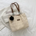 Beige quilted fabric tote bag with brown leather handles and a black fur ball charm - White (Without Charm)