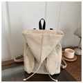 Chic beige backpack with rabbit ear design and drawstring on a minimalist desk - Khaki