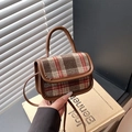 Mini plaid crossbody bag with brown leather accents and a sturdy semi-circular handle - Brown