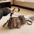 Retro brown faux suede shoulder bag featuring a decorative buckle and versatile straps - Brown