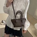 Deep coffee litchi pattern bucket bag with double handles and shoulder strap - Brown