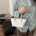 Mini white bucket bag with lychee grain leather texture and dual shoulder straps - White