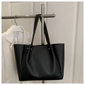 Detail of silver rivets on black matte PU leather tote bag with pleated texture - Black