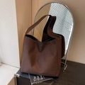 Brown matte PU leather large tote bag for women showing a minimalist shoulder strap style - Coffee