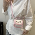 Mini cherry print crossbody bag for girls in pink and white with a top handle and strap - Pink