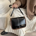 Vintage black oil wax shoulder bag with brown edges and golden metal logo detail - Black and Brown