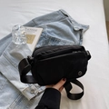 Black multi-zipper nylon crossbody bag with adjustable strap and round metal logo - Black
