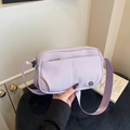 Lavender purple nylon crossbody bag with dual zippers and adjustable shoulder strap - Purple
