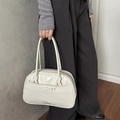Chic creamy white glossy shoulder bag with elegant bow detail and dual handles - White