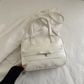 Creamy white large tote bag with ribbon bow and heart pendant on white striped shirt - White