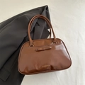 Classic dark brown PU leather tote bag featuring a leather bow and golden logo - Tan