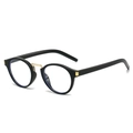 Occhiali da sole ovali retrò con montatura nera, ponte dorato e lenti anti-luce blu chiare - Montatura nero lucido / Trasparente (Anti-luce blu)