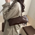 Minimalist dark brown glossy underarm bag with white text and side drawstring details - Coffee
