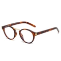 Occhiali da sole ovali tartarugati con ponte dorato e montura dal design retrò moda - Montatura Leopardata / Trasparente (Anti-luce blu)
