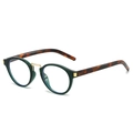 Occhiali da sole ovali retrò con montatura verde scuro e ponte in metallo dorato stile vintage - Montatura Verde / Trasparente (Anti-luce blu)