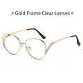 Lunettes oversize en métal doré avec accents de diamants et verres clairs - Standard / Monture dorée standard avec verres transparents