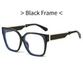 Fashionable oversized blue light blocking glasses with black frame and blue trim accents - Black Frame