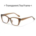 Montatura occhiali quadrata cat-eye ambra trasparente con anima metallica nelle aste - Tè Trasparente