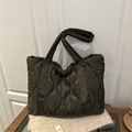Deep olive green quilted puffer tote bag with wave stitching and padded shoulder straps - Green