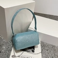 Light blue glitter cylinder handbag with silver chain strap and top handle design - Blue