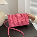 Pink pleated cloud bag with soft leather texture and adjustable matching shoulder strap - Rose Pink